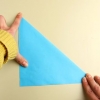 At lave en simpel lotusblomst med origami