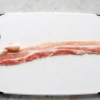 At lave pølser pakket ind i bacon