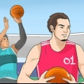 At spille basketball