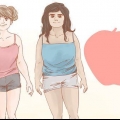 Påklædning af en æbleformet figur