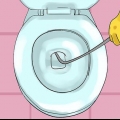 Frigør et toilet med en kloakfjeder