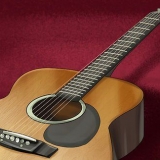 Reducer handlingen af ​​en akustisk guitar