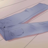 Tager størrelsen af ​​jeans