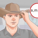 Iført en cowboyhat på den rigtige måde