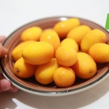 Spise en kumquat