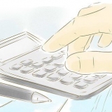 Udarbejd et månedligt budget