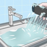 Gemmer en våd mobiltelefon