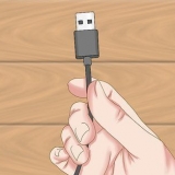Tilslutning af en pc til en telefon