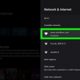 Par en tablet trådløst med et tv