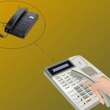 Foretag et tre-vejs telefonopkald