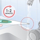 Desinficer et termometer
