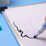Rengøring af en whiteboardtavle