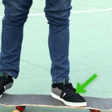 Hold dig balanceret på et skateboard