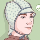 Få dit hår gennem en highlighting-kasket selv