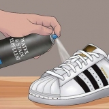 Holder hvide adidas superstars rene