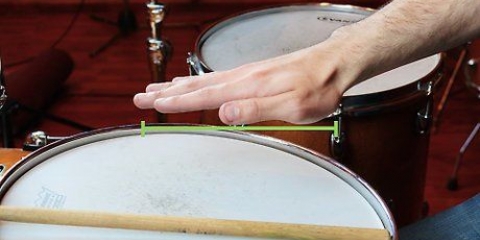 Holder trommestikker