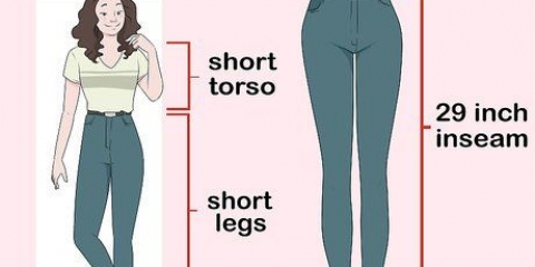 Iført højtaljede jeans