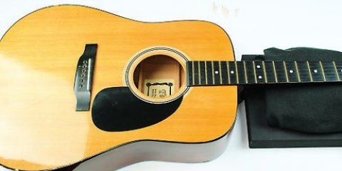 Udskiftning af guitarstrenge