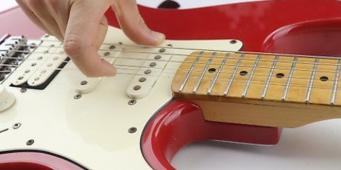 Skift strenge på en elektrisk guitar