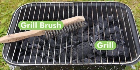 Stegning af fisk på en grill