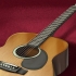Reducer handlingen af ​​en akustisk guitar