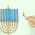 Optænding af en hanukkah menorah