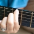 At stemme en guitar