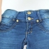 Udspænder et par jeans