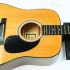 Udskiftning af guitarstrenge